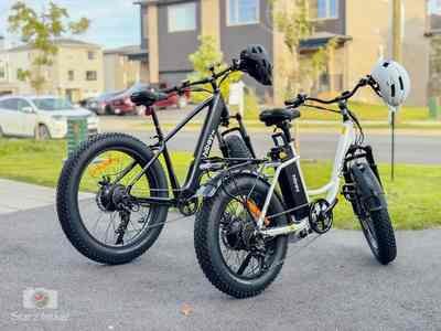 Two Hiboy electric fat-tire e-bikes with helmets, available for guests at Starz at Night Luxury Suite in Lantz, Nova Scotia